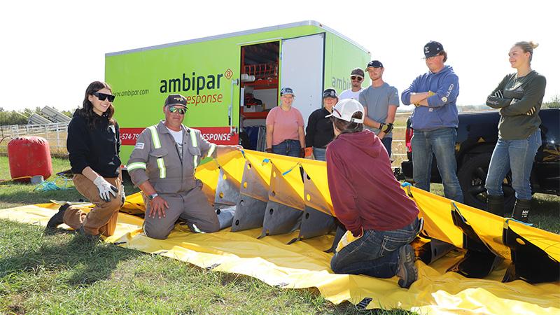 Students learning spill response from Ambipar Response